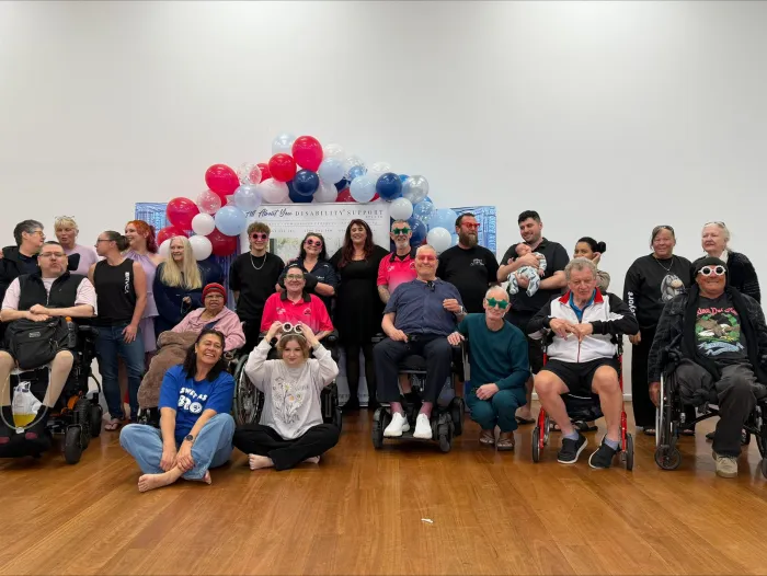 Participants and support workers gathered at an AAYDS community celebration